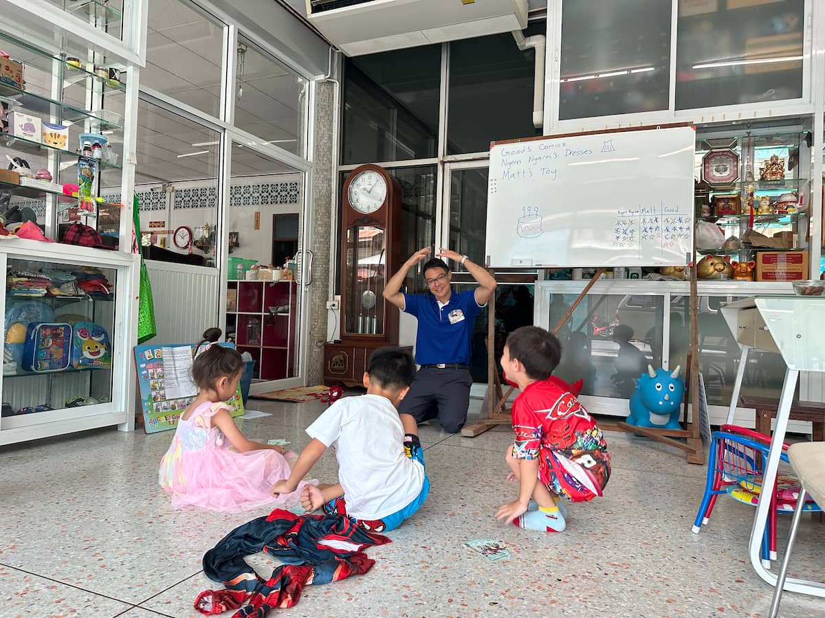 Teacher Dan G.K. Mills teaches first kindergarten business English ESL class in Thailand. Teacher Dan G.K. Mills teaches first kindergarten business English ESL class in Thailand.